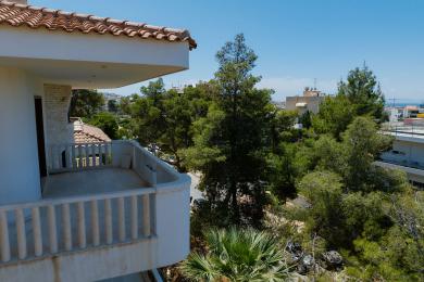 CORNER THREE-STOREY HOUSE